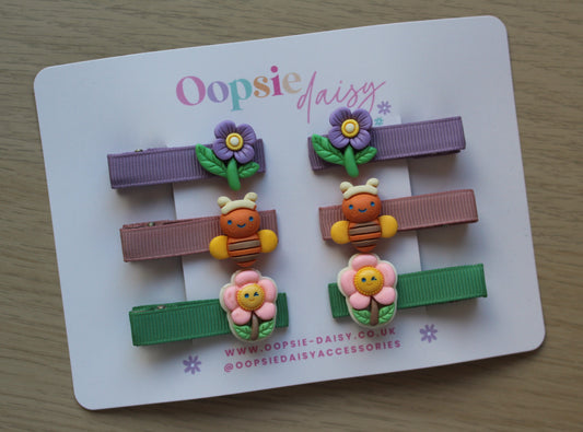 Hair sliders with 3d flower embellishments