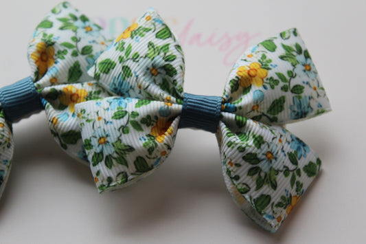 Hair bows with ditsy blue floral design