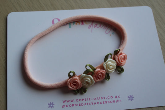 Delicate peach floral baby headband
