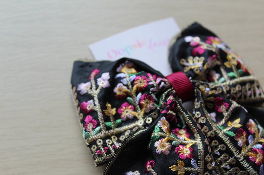 Black and burgundy hair bow with floral embroidery