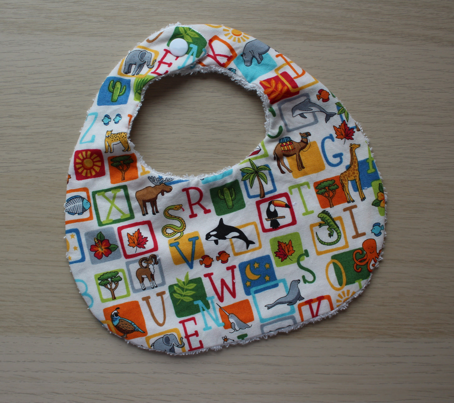 Animal and alphabet themed baby bib