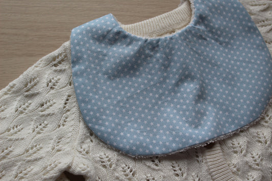 Pale blue baby bib with white stars