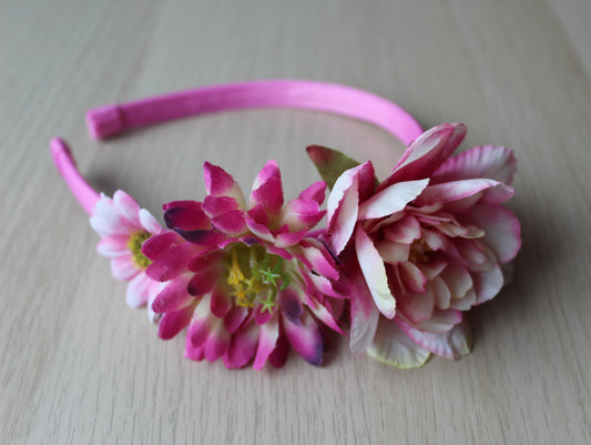 Floral headband with a mix of pink flowers