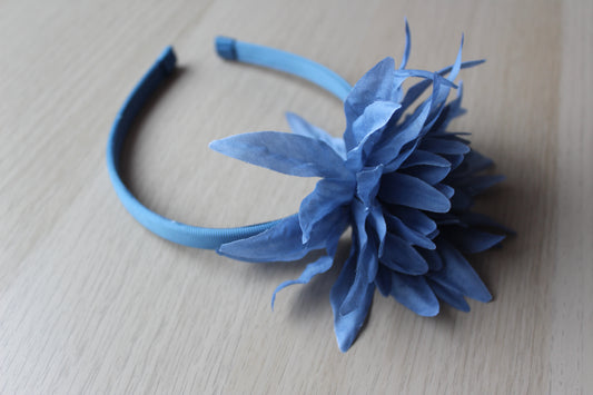 Blue headband with large blue flower