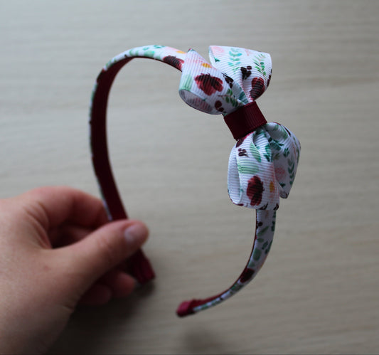 Floral headband with bow and burgundy colours