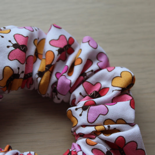 scrunchie with pink and orange butterfly pattern
