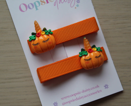 Hair clips with cute pumpkin embellishment