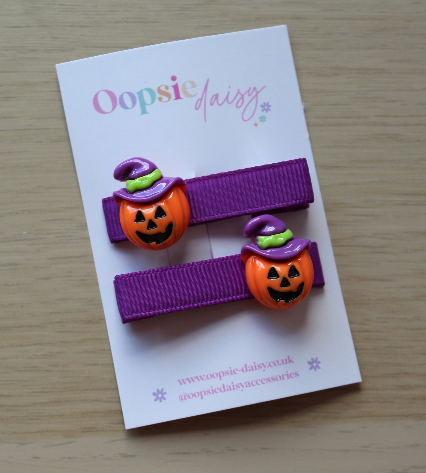 Halloween themed hair clips with scary pumpkins