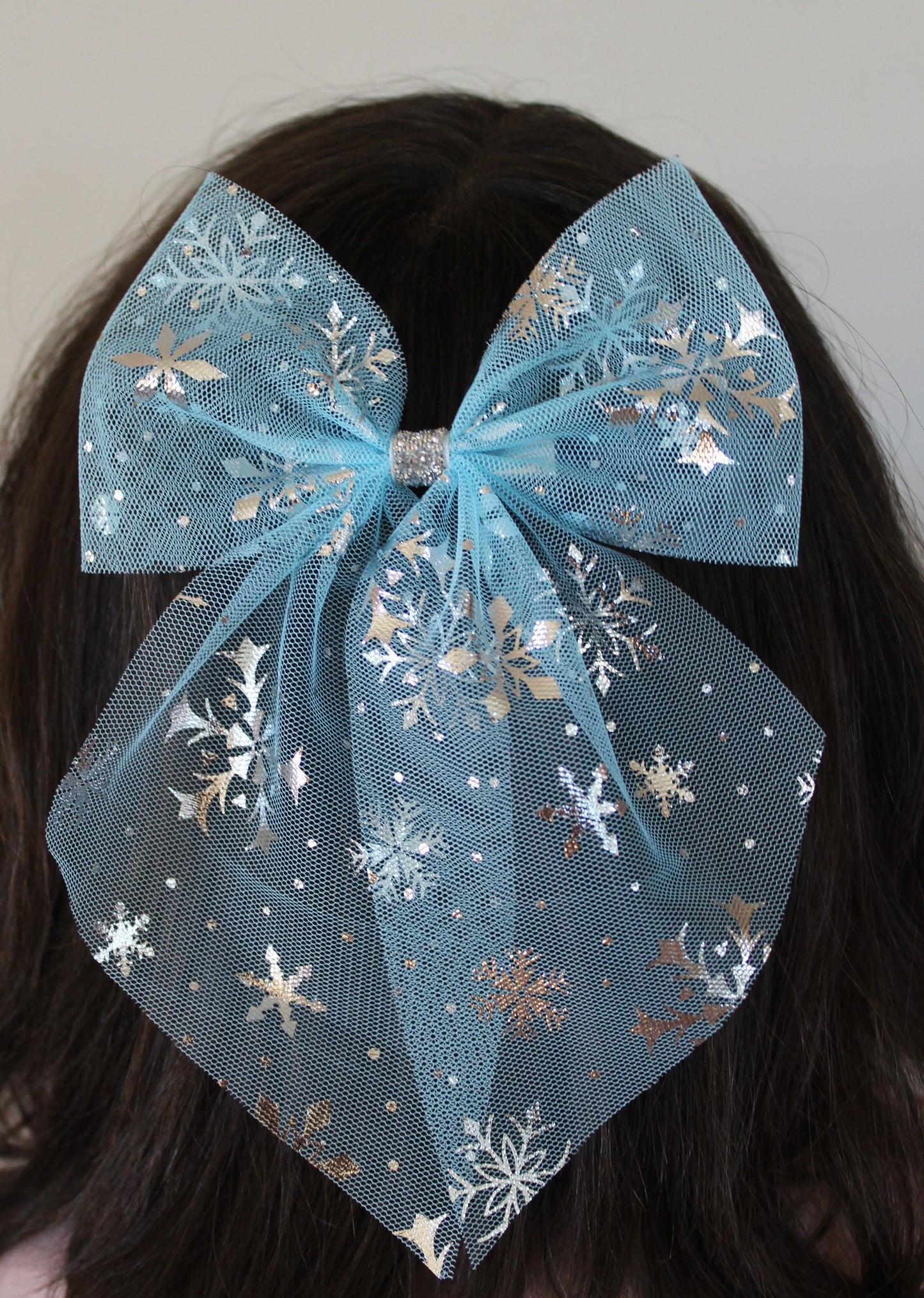Blue shiny snowflake sparkly hair bow