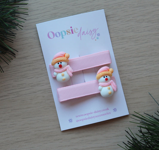 Pink Christmas hair clips with snowman