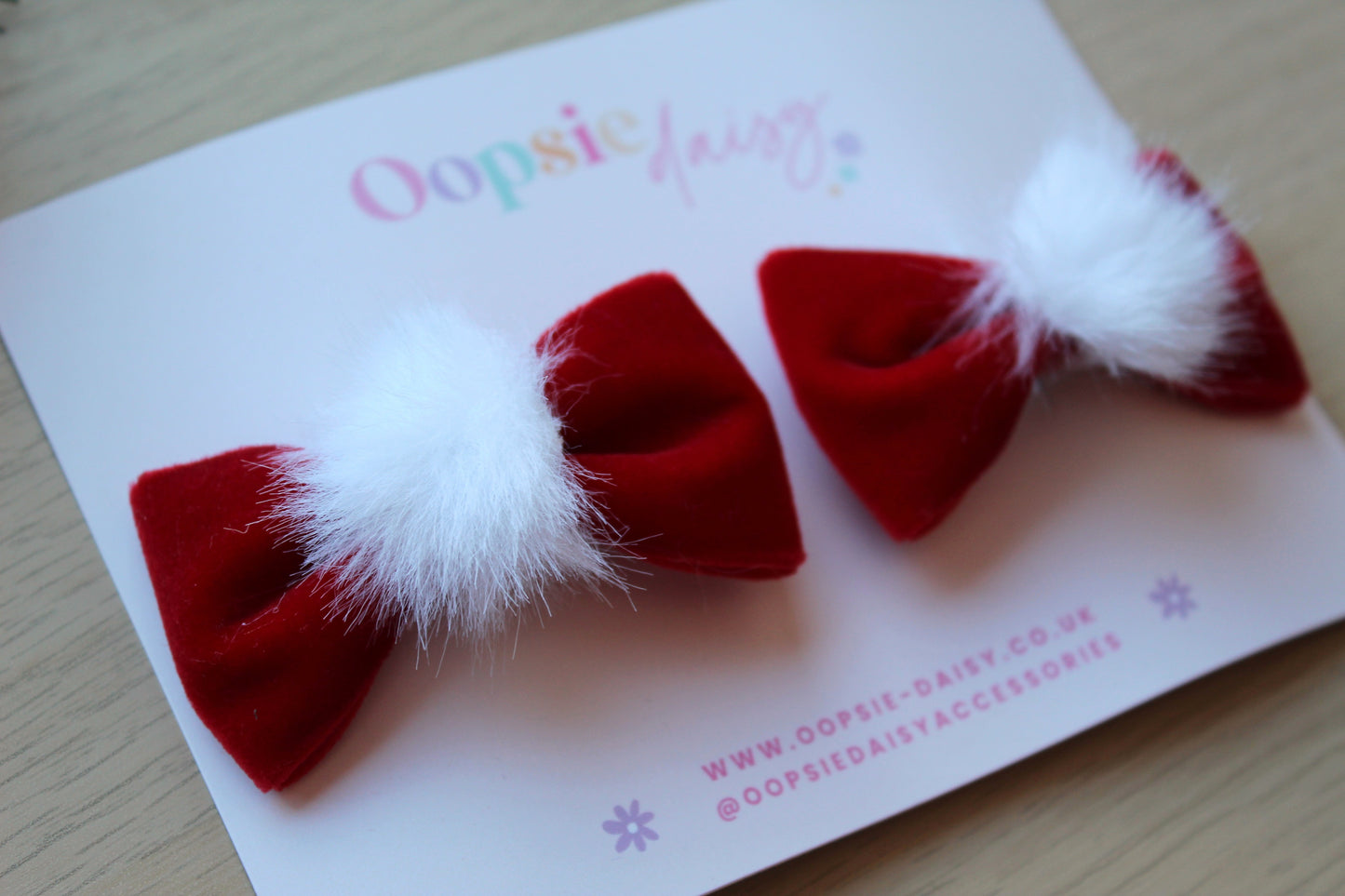 Santa themed hair bows in red velvet