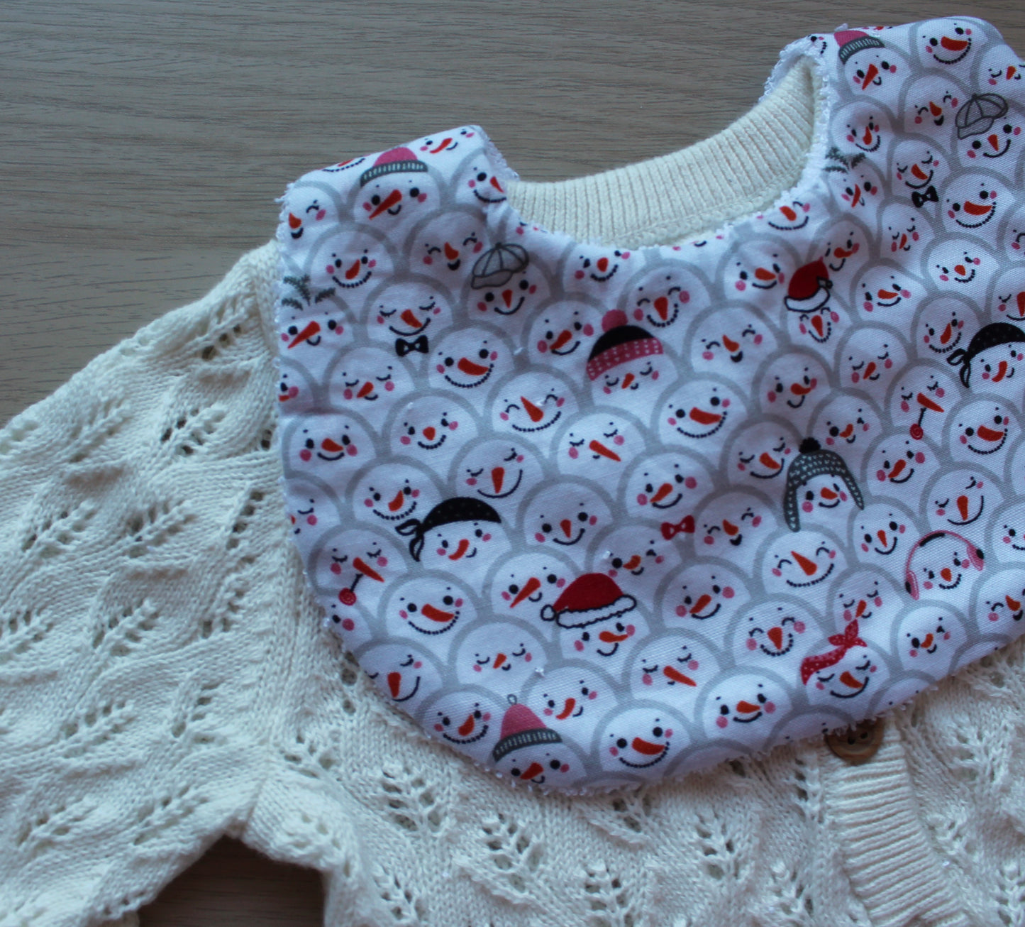 Snowman themed baby bib