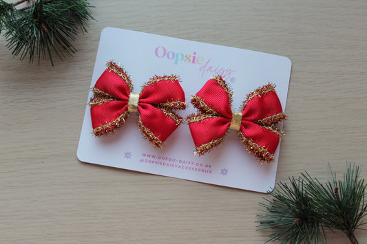 Set of 2 red hair bows with gold tinsel