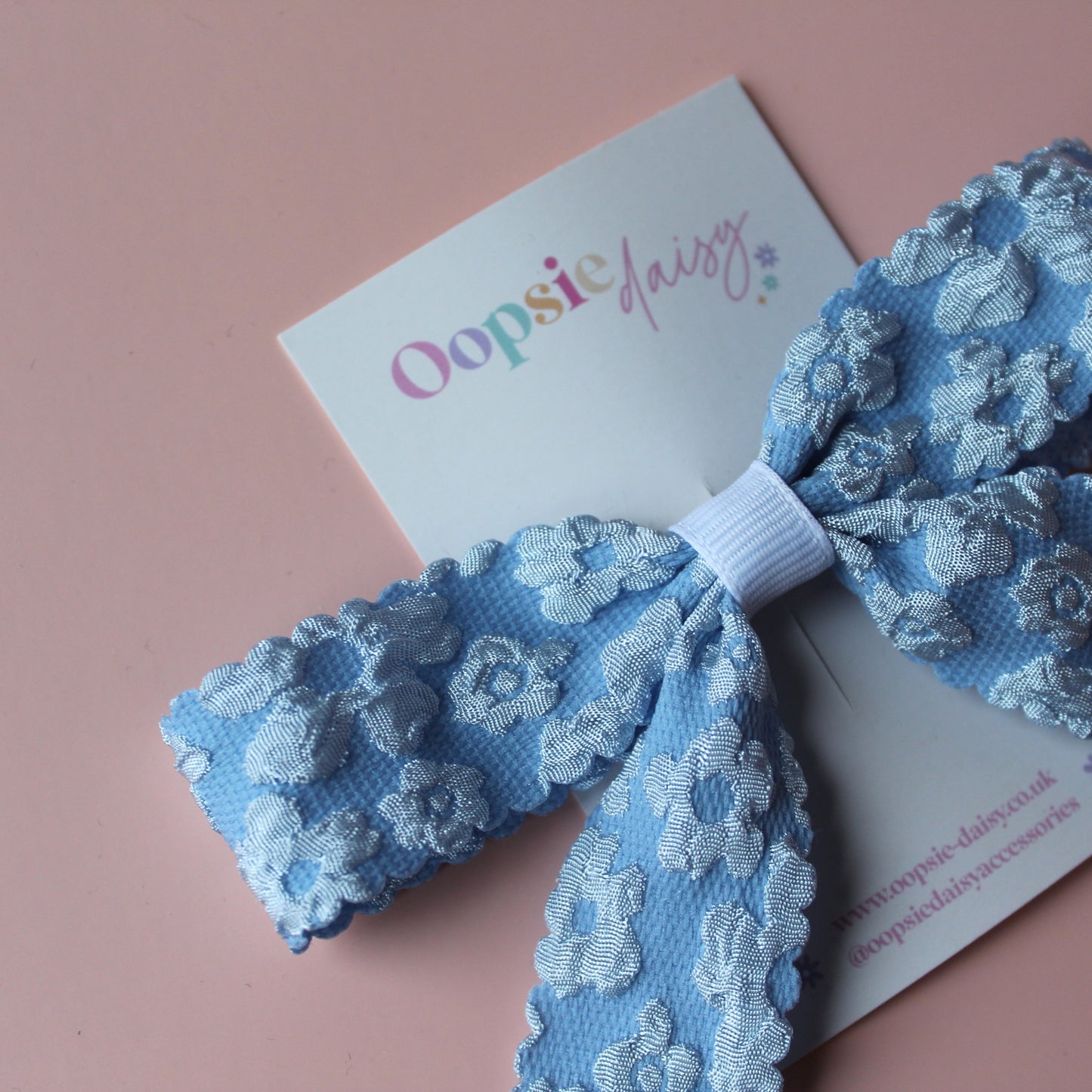 Pale blue floral hair bow