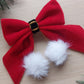 Festive santa inspired hair bow with red velvet and white fur