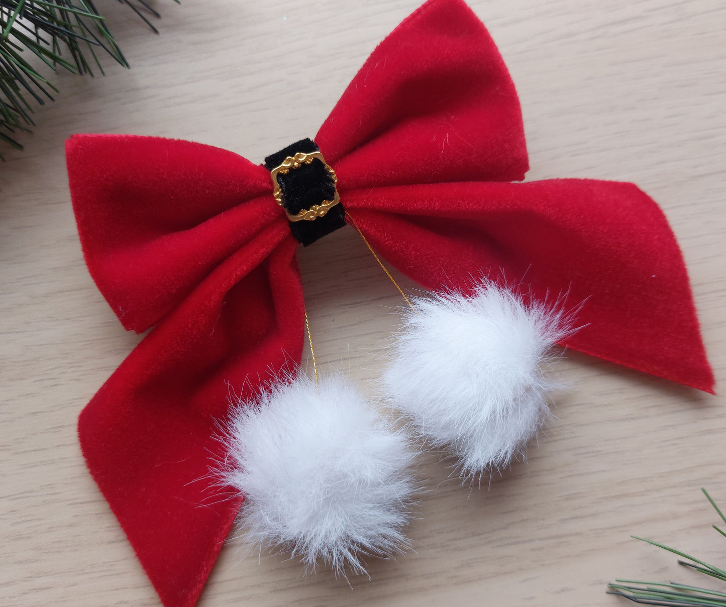 Festive santa inspired hair bow with red velvet and white fur