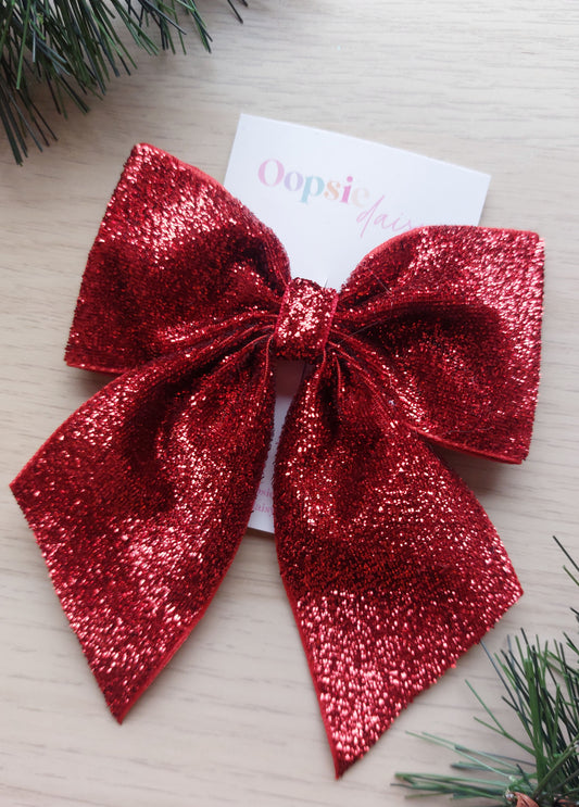 Red glittery festive hair bow
