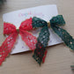 Set of two festive lace hair bows with gold details