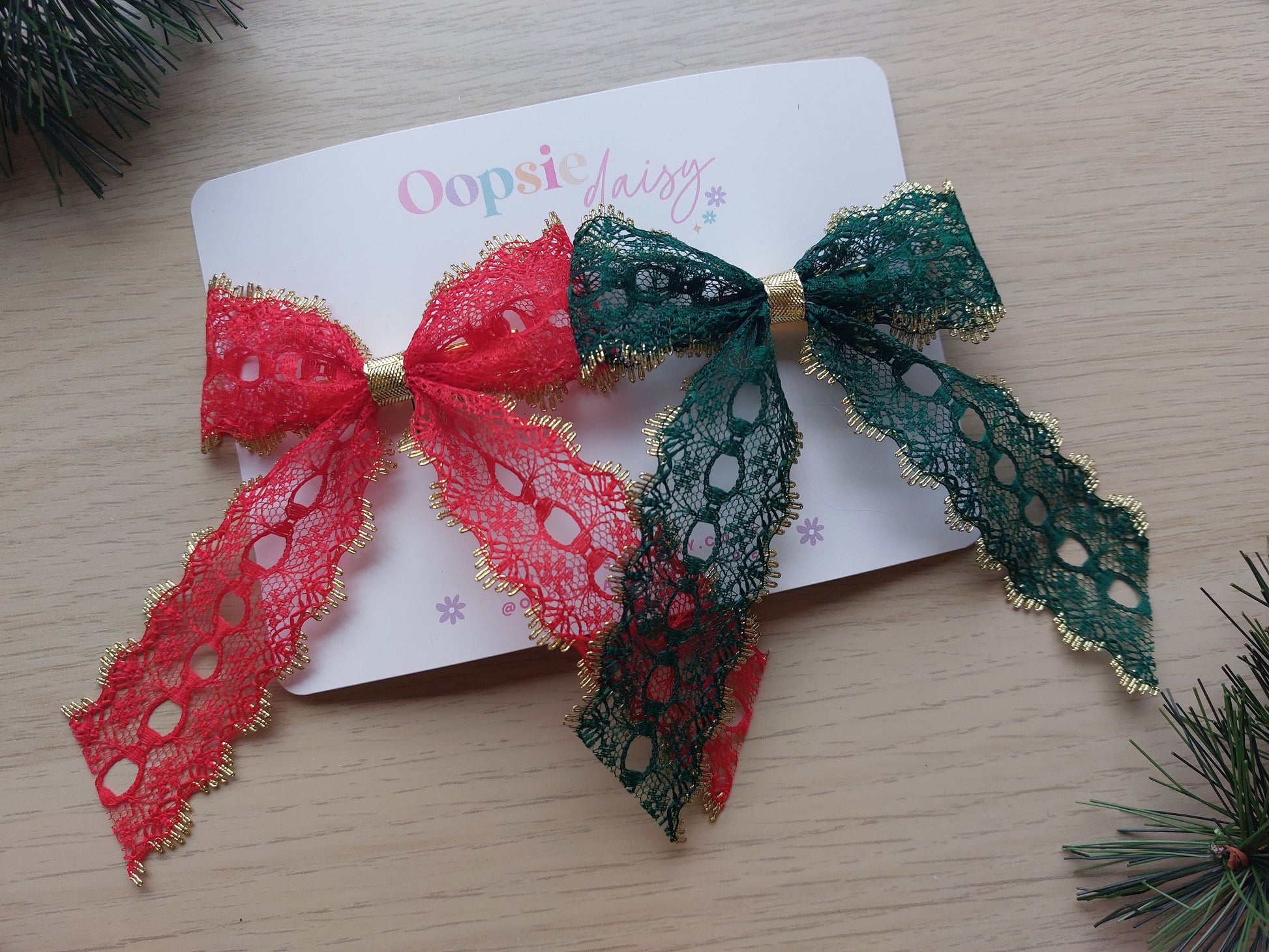 Set of two festive lace hair bows with gold details
