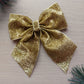 Gold shimmer glitter hair bow