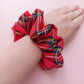 Royal Stewart tartan oversized scrunchie. Red tartan with black, yellow, blue and orange checks. 