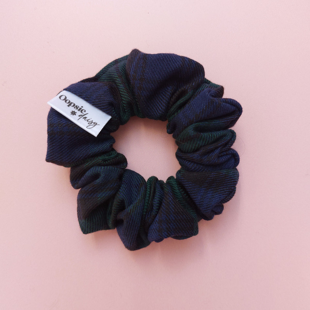 fabric hair scrunchie made from Black Watch navy and green tartan. 