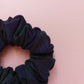 fabric hair scrunchie made from Black Watch navy and green tartan. 