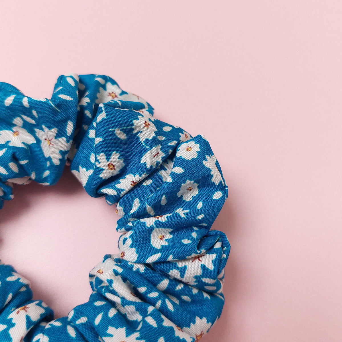 Blue hair scrunchie with ditsy off-white flowers