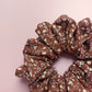 Brown oversized hair scrunchie with small cream ditsy flowers