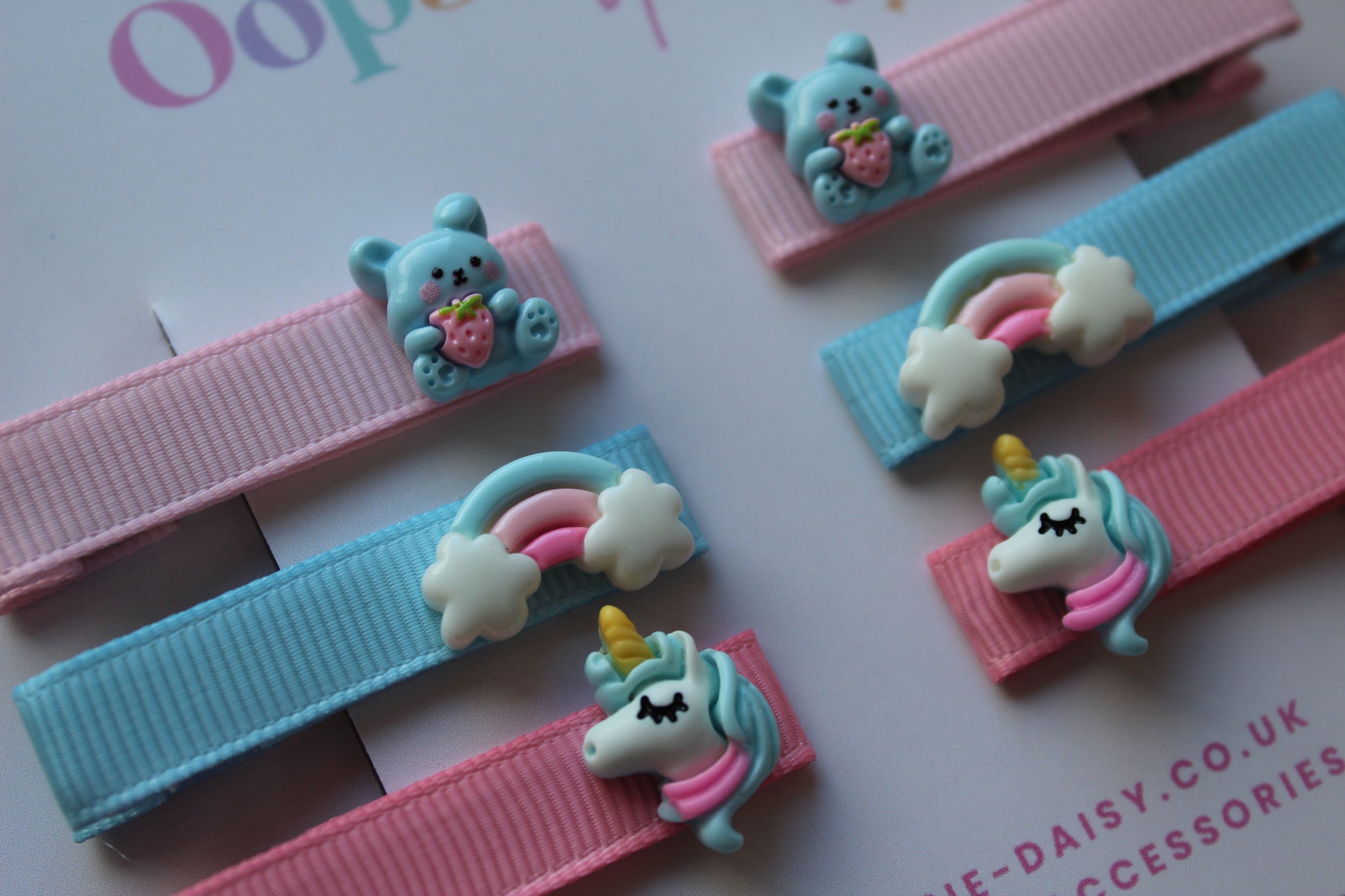 Blue & pink 3D hair slides with unicorn, rabbit and rainbow