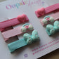 Set of pink and blue hair clips 