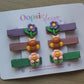 Hair sliders with 3d flower embellishments