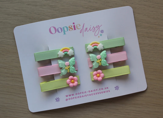 Set of colourful 3d hair clips with butterfly, flower, rainbow
