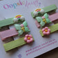 Set of colourful 3d hair clips with butterfly, flower, rainbow