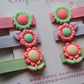 Set of colourful hair clips with floral designs