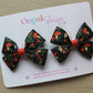 Pair forest-themed hair bows with foxes and toadstools