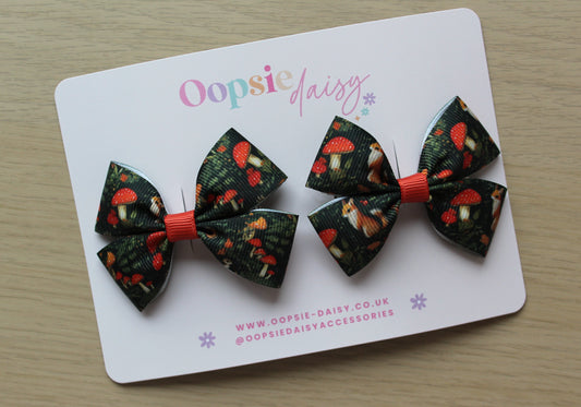 Pair forest-themed hair bows with foxes and toadstools