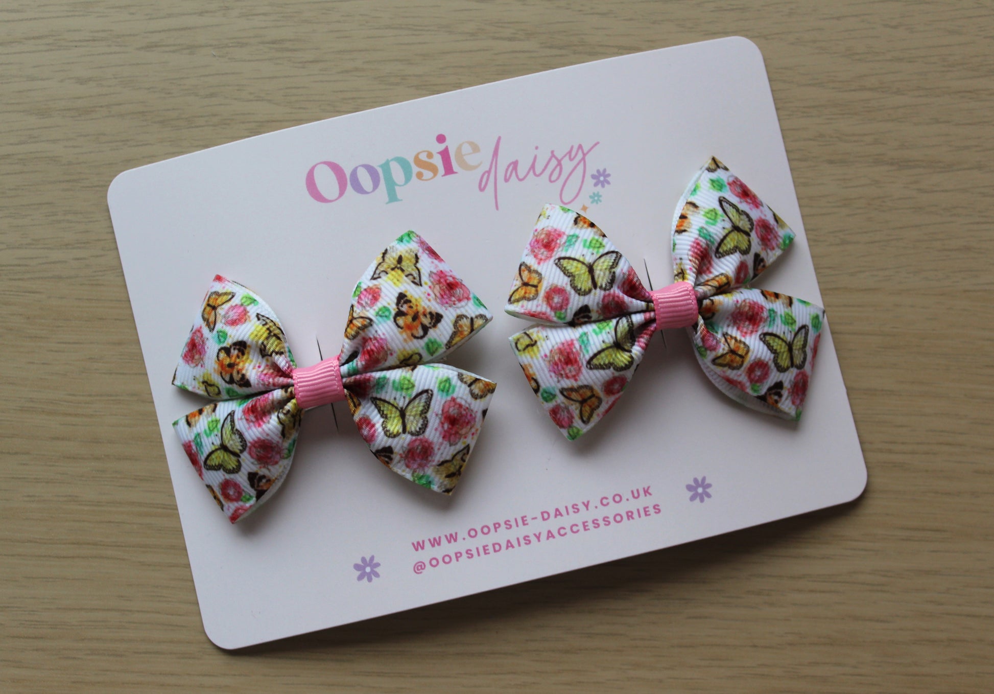 Pair hair bow clips with vintage butterfly design
