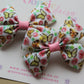 Pair colourful butterfly-themed hair bows 