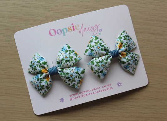 Ditsy blue floral hair bow clips