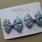 Pair colourful baby animal bow hair clips. 