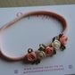 Delicate peach floral baby headband