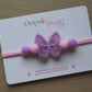 Pink and purple baby headband with butterfly