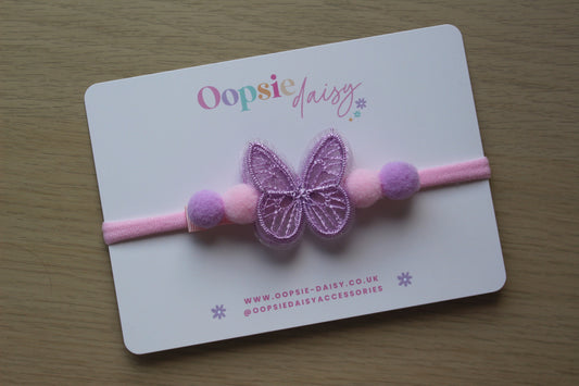 Pink and purple baby headband with butterfly