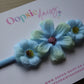 Blue baby headband with pretty blue flowers
