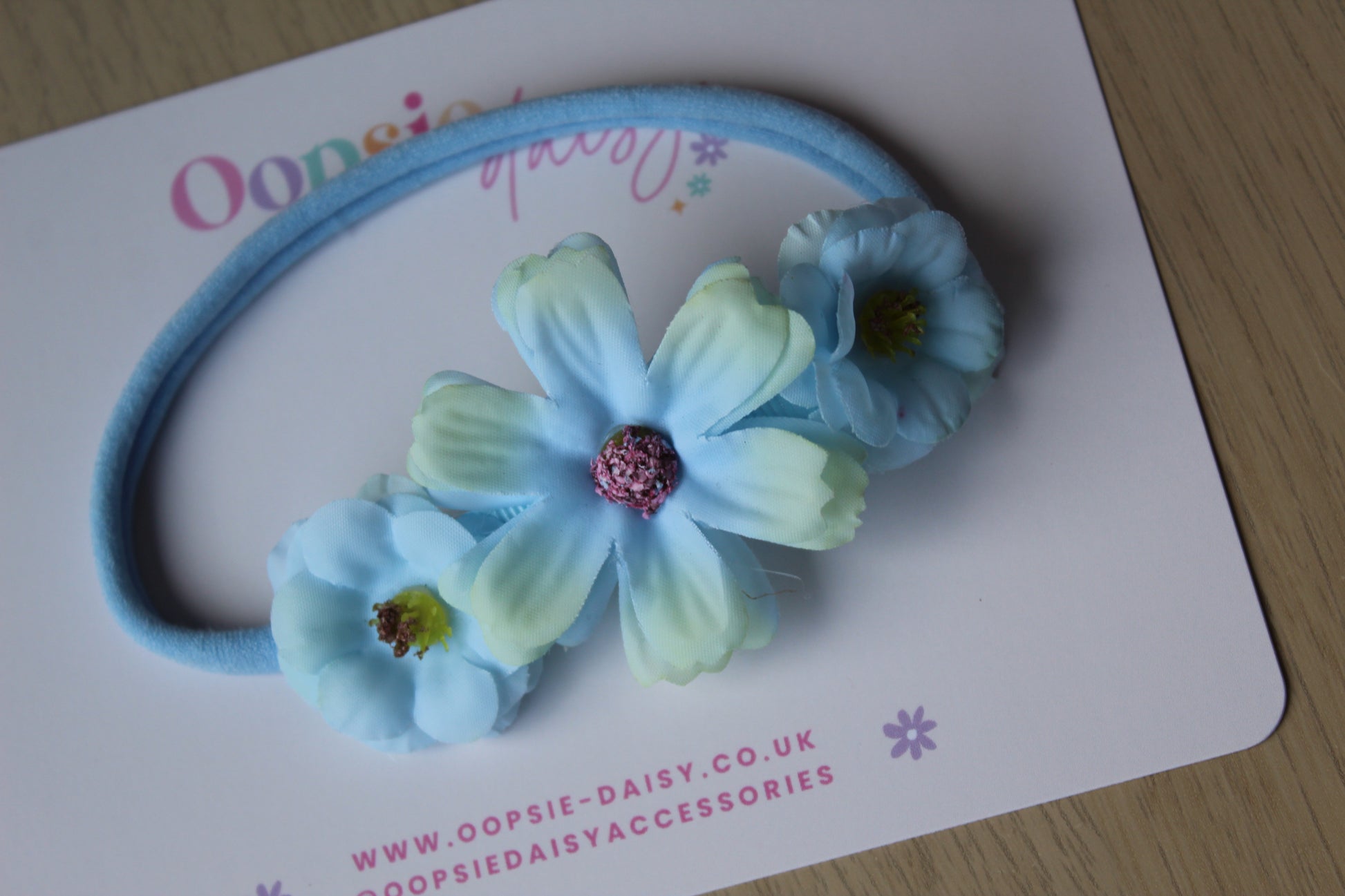 Baby headband with blue flowers