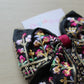 Black and burgundy hair bow with floral embroidery 