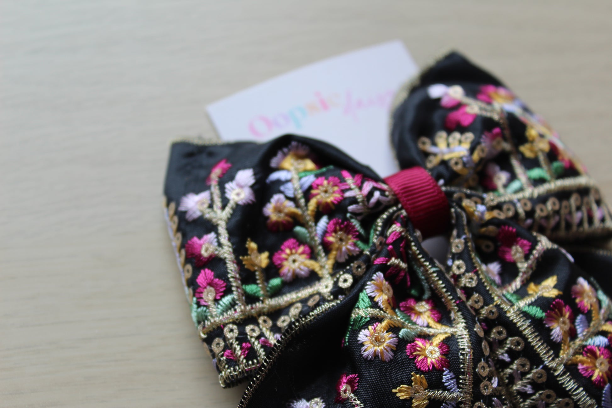 Black and burgundy hair bow with floral embroidery 