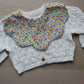 Scallop baby bib with Liberty floral pattern