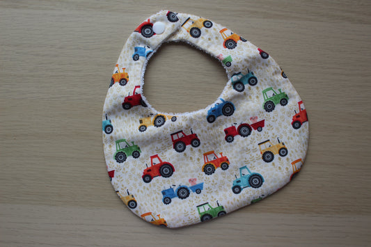 Tractor themed baby bib